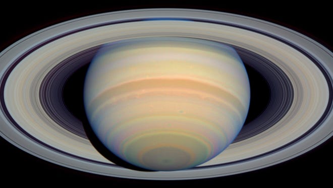 You’ll view Saturn with its rings, as seen by the Cassini spacecraft. Note the oval shadow of Saturn that is cast upon the left side of the rings. Saturn is nine times wider than earth, which could fit neatly between the planet and its innermost ring.