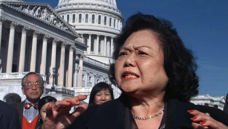 Rep. Patsy Mink, D-Hawaii, meets reporters on Capitol Hill on Nov. 5, 1997, in Washington. Mink, 74, died Sept. 28, 2002, in Honolulu. Mink was a congresswoman from Hawaii, serving a total of 12 terms. She was born and raised on Maui, became the first Japanese American female attorney in Hawaii and served in the territorial and state legislatures beginning in 1956. In 1964 she became the first woman of color elected to Congress. She is best   known for co-authoring and championing Title IX of the Education Amendments of 1972.