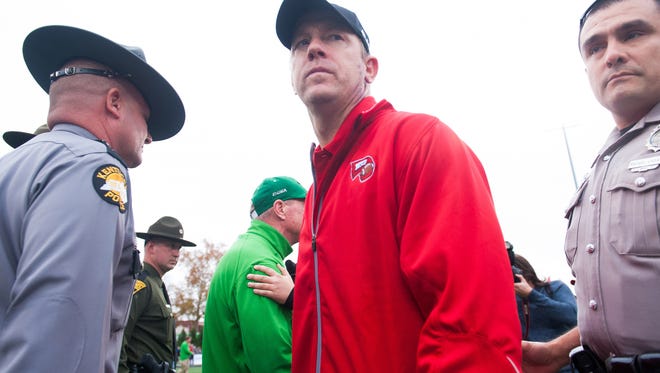 Nov 27, 2015; Bowling Green, KY, USA; Western Kentucky Hilltoppers head coach Jeff Brohm walks on the field after the second half against Marshall Thundering Herd at Houchens Industries-L.T. Smith Stadium. Western Kentucky Hilltoppers won 49-28. Mandatory Credit: Joshua Lindsey-USA TODAY Sports