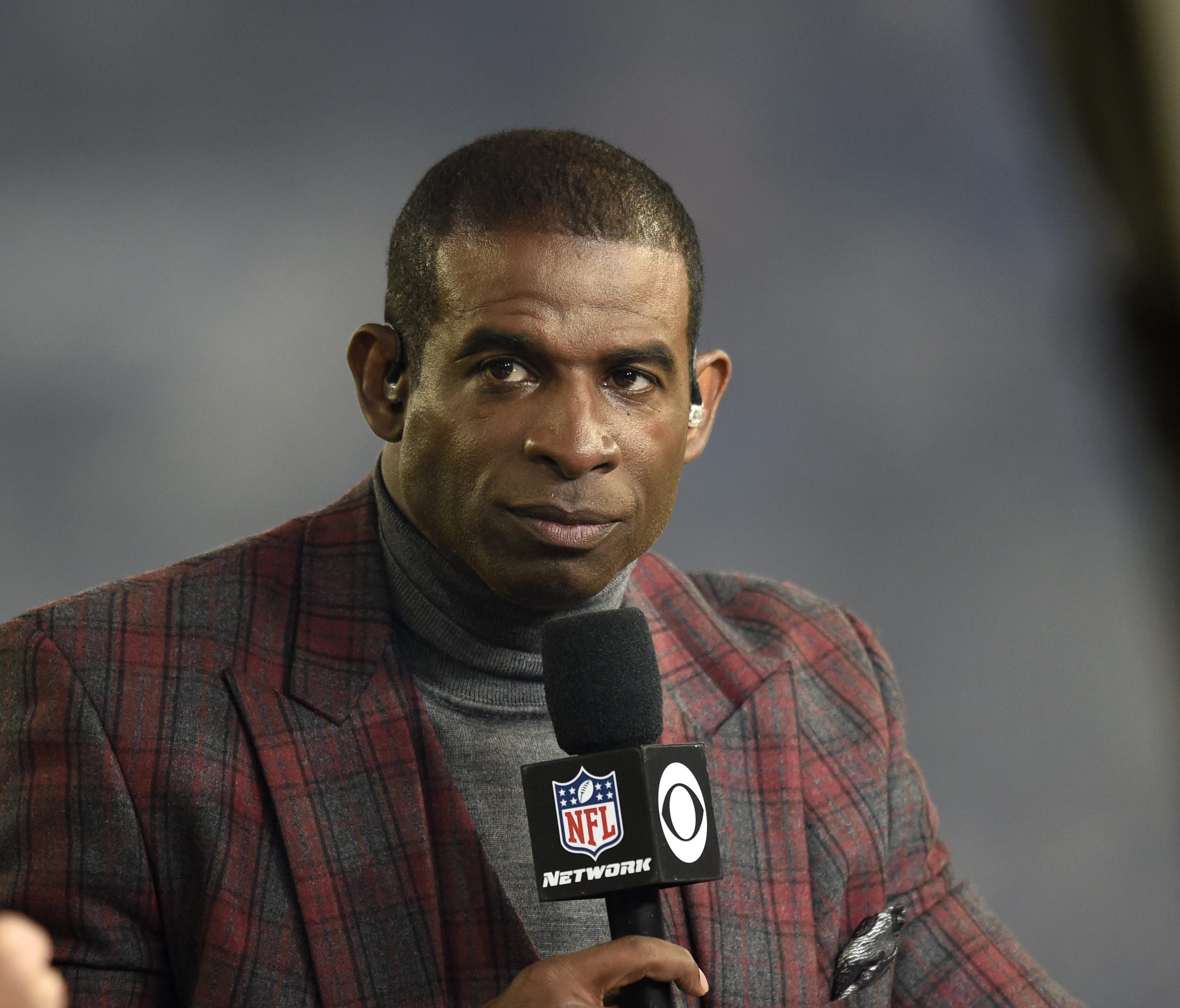 Deion Sanders speaks on the Thursday Night Football set during halftime in an NFL football game between the Baltimore Ravens and the Miami Dolphins, Thursday, Oct. 26, 2017, in Baltimore. (AP Photo/Gail Burton) ORG XMIT: OTK