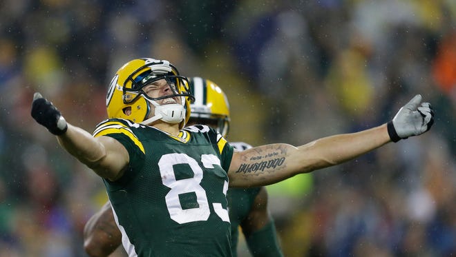Green Bay Packers wide receiver Jeff Janis (83) celebrates his special teams tackle against the Dallas Cowboys at Lambeau Field.
