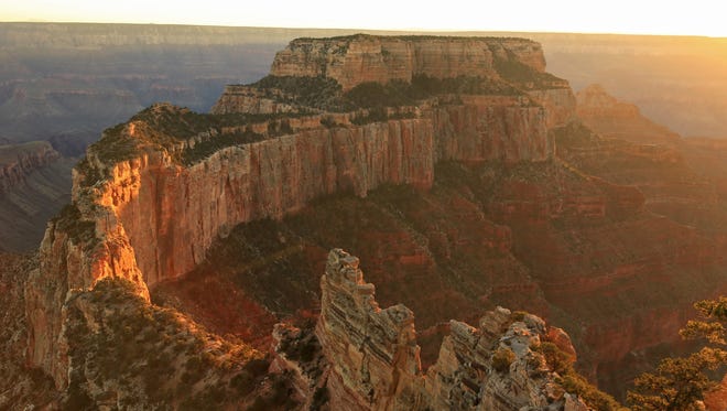 The sun sets over Cape Royal at the North Rim in Grand Canyon National Park.