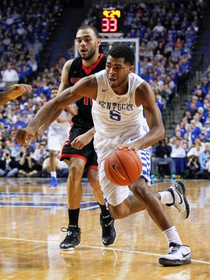 Kentucky's Andrew Harrison scored 23 points with seven assists and one steal in 31 minutes during the Wildcats' 69-58 win over the Georgia. By Matt Stone, The Courier-Journal February 3, 2015