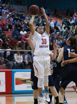 Shiprock's Tia Woods coverts a layup against Piedra Vista on Friday at the Chieftain Pit in Shiprock.