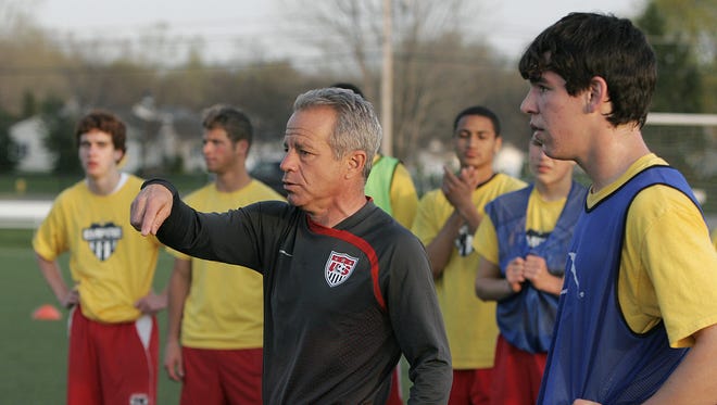 Brighton native Dave Sarachan instructs Empire United players in a drill at Roberts Wesleyan College in 2008.