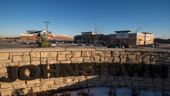 The Scheels sports store shares a parking lot with other recently opened businesses, as seen Wednesday, Jan. 17, 2017, at the Johnstown Plaza in Johnstown, Colo.
