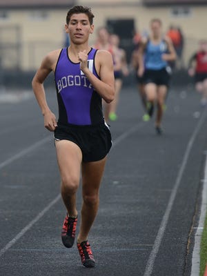 Danny Daurio of Bogota on his way to finishing first in the 1600m at the Red Littler Bergen Championships at Hasbrouck Heights High School.