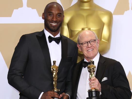 Kobe Bryant, left, and Glen Keane, winners of the award