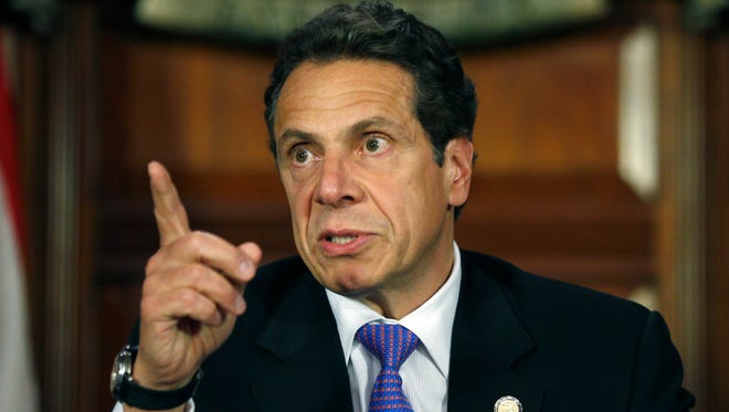 New York Gov. Andrew Cuomo speaks during a news conference announcing an agreement on legislation legalizing medical marijuana at the Capitol on Thursday, June 19, 2014, in Albany, N.Y.