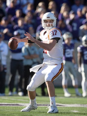 Iowa State Cyclones quarterback Kyle Kempt (17) drops