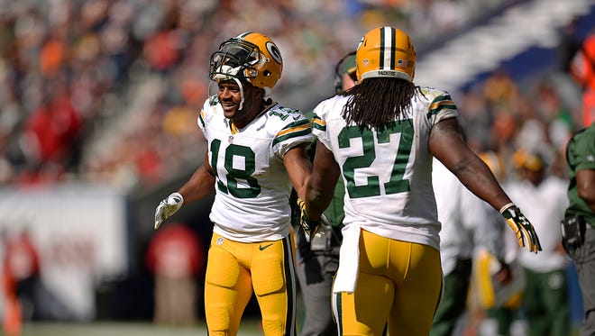 Green Bay Packers receiver Randall Cobb is all smiles after the Packers scored a touchdown against the Chicago Bears during Sunday's game at Soldier Field in Chicago.