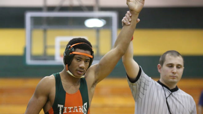 East Ramapo's Jhavon Innocent takes the win in a 170-pound match during a quad meet in the Section 1 dual meet championships at Ramapo High School in Spring Valley on Wednesday, Dec. 2, 2015. East Ramapo defeated Yonkers 53-29 and advances to the semifinals.
