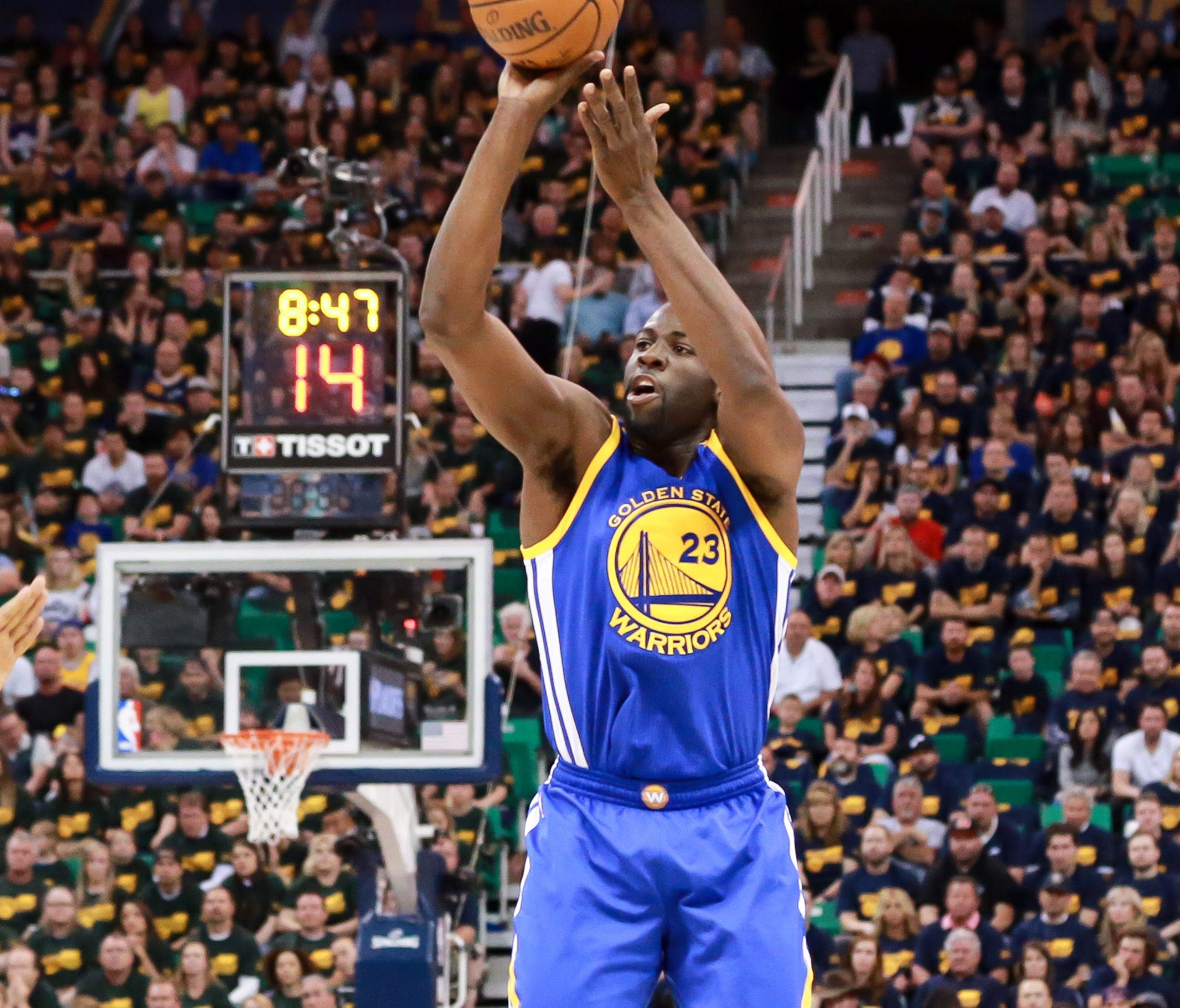 Golden State Warriors forward Draymond Green shoots a jump shot during the first quarter against the Utah Jazz in Game 3.