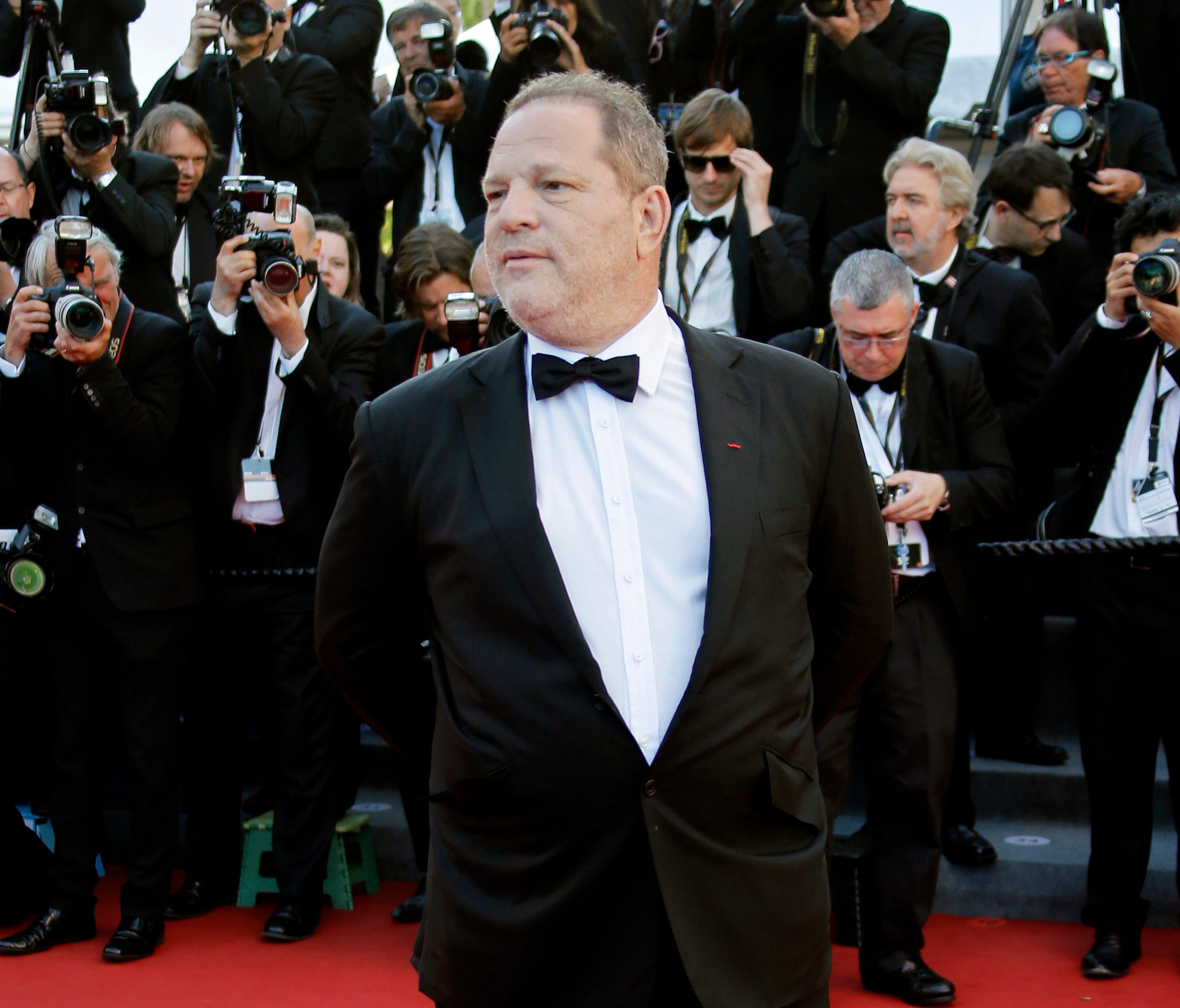 Multiple outlets report that disgraced Hollywood studio boss Harvey Weinstein, seen here at the 2013 Academy Awards, will surrender to authorities in New York Friday.