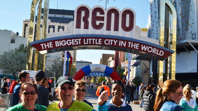 Runners take part in the the Downtown River Run in April 2013.