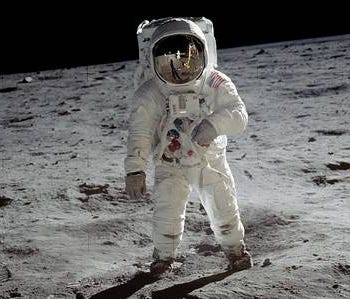 Astronaut Buzz Aldrin walks on the surface of the moon during the Apollo 11 mission. Mission commander Neil Armstrong took this photograph with a 70-mm lunar surface camera.