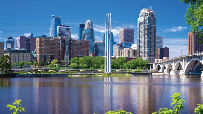The downtown skyline in Minneapolis. The minimum wage is rising significantly in both the city and the state of Minnesota.