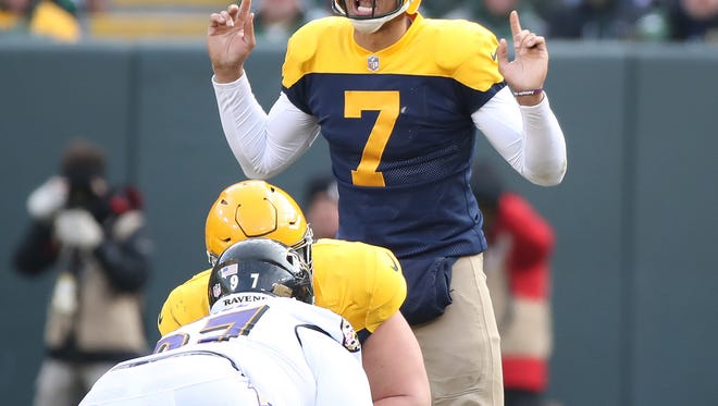 Green Bay Packers quarterback Brett Hundley (7) signals at the line of scrimmage against the Baltimore Ravens on Sunday, Nov. 19, 2017 at Lambeau Field.