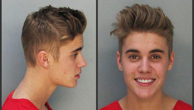 Police booking mugs of Justin Bieber, who was arrested Jan. 23, 2014.