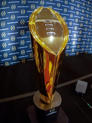 The College Football Playoff national championship trophy.