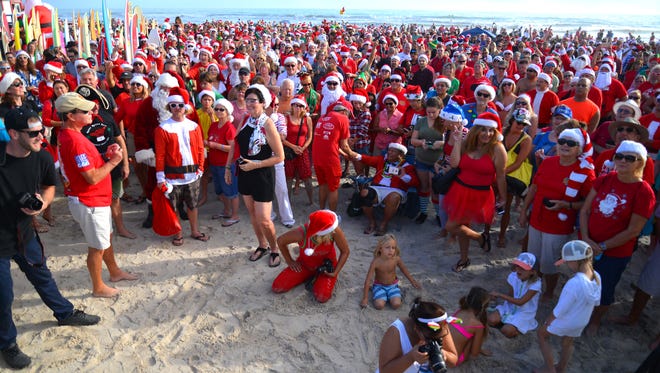 Last Christmas Eve, Surfing Santas drew 772 costumed surfers to Cocoa Beach.