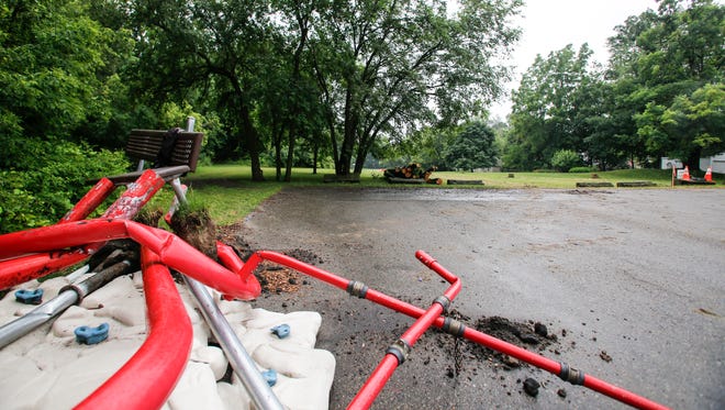 Cut down trees and torn down playground equipment were seen July 10 near the entrance to Ormond Park, adjacent to Groesbeck Golf Course. Mayor Virg Bernero's administration wants to build an entrance to Groesbeck Golf Course through the park.