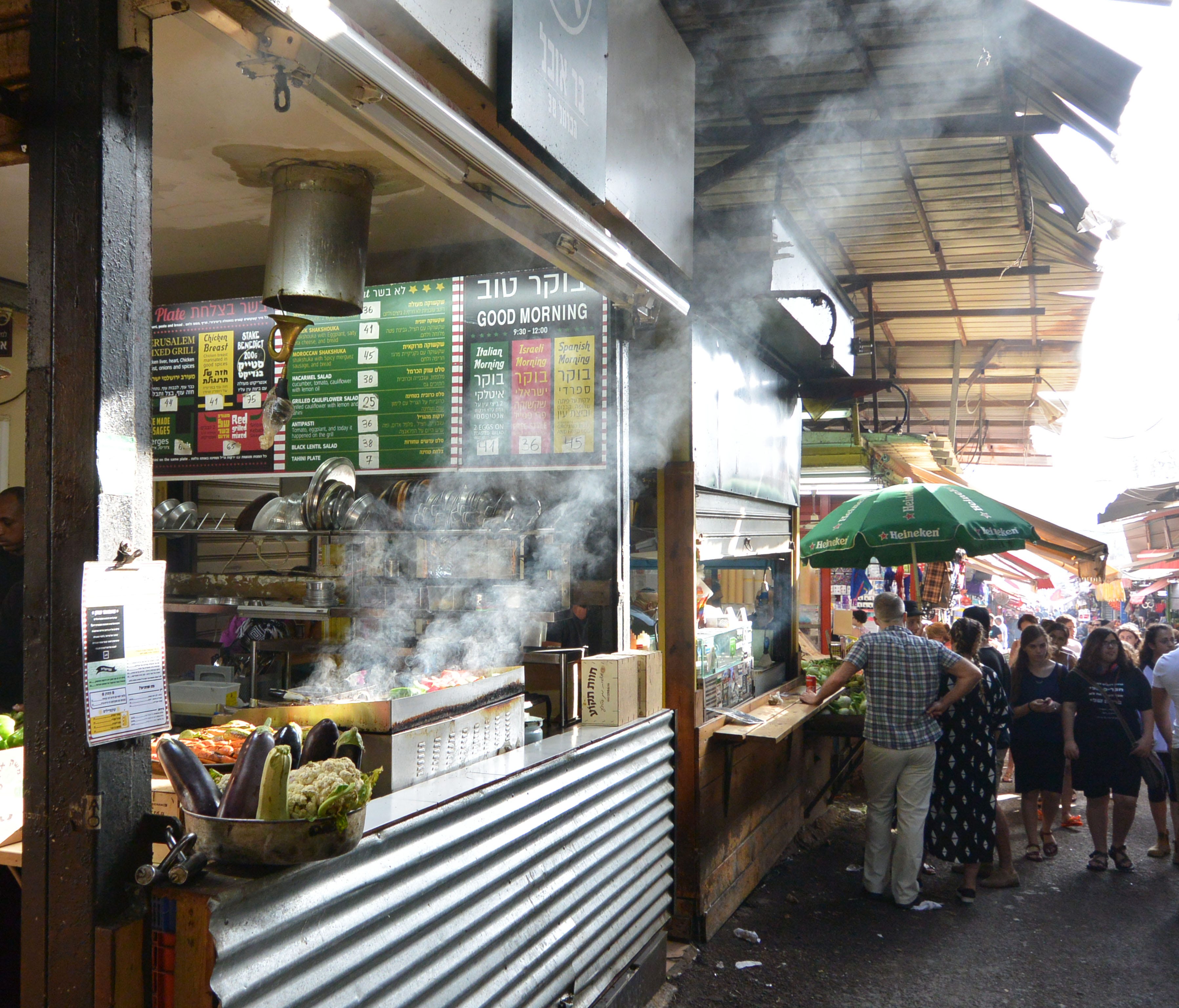 Tiny eateries and hustling kiosks pepper the market, while larger restaurants (mostly svelte cafés with seats spilling onto the streets) pull fresh market flavors and young crowds.