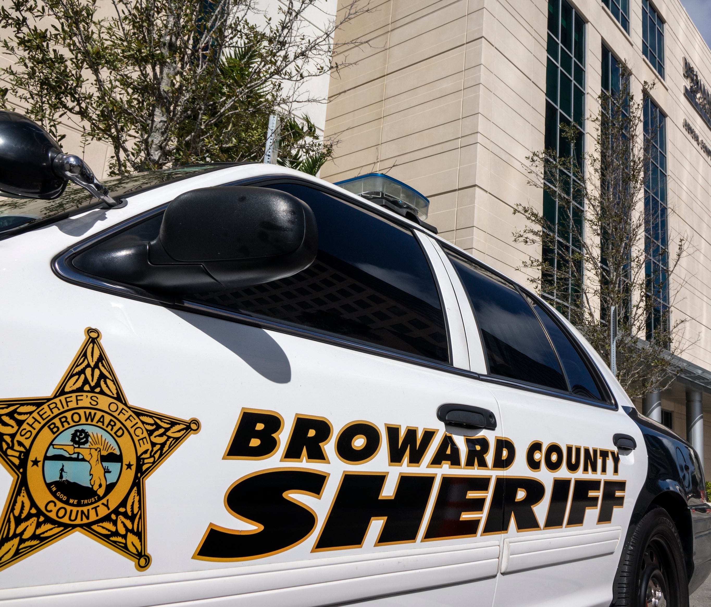 A Broward County Sheriff's car is parked in front of the Judicial Complex in Fort Lauderdale, Fla.  Feb. 19, 2018.