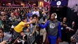 Kevin Durant high fives fans before Game 3.