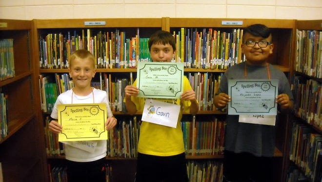 Cleveland Elementary School recently held its annual spelling bee with Mason Kieckhafer, left, finishing first. Gavin Meissner, middle, was second and Alejandro Lopez, right, was third.