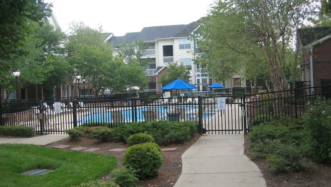 The Wyndchase Bellevue features a community pool and picnic area situated in the center of the complex.