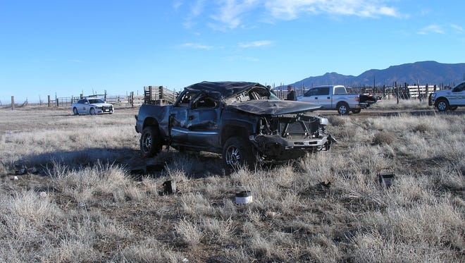 A damaged pickup truck sits alongside State route 56 near Beryl. The driver, a 20-year-old from Colorado City, was injured in the crash, while his 19-year-old passenger was thrown from the vehicle and died on scene. Neither was wearing a seatbelt, according to the Utah Highway Patrol.