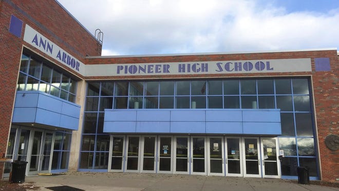 This April 1, 2018, photo shows Pioneer High School in Ann Arbor, Mich. A gun openly carried by a spectator at a school concert at Pioneer High School in 2015 has turned into a major legal case as the Michigan Supreme Court considers whether the state’s public schools can trump the Legislature and adopt their own restrictions on firearms. Michigan’s high court is set to hear arguments Wednesday, April 11.