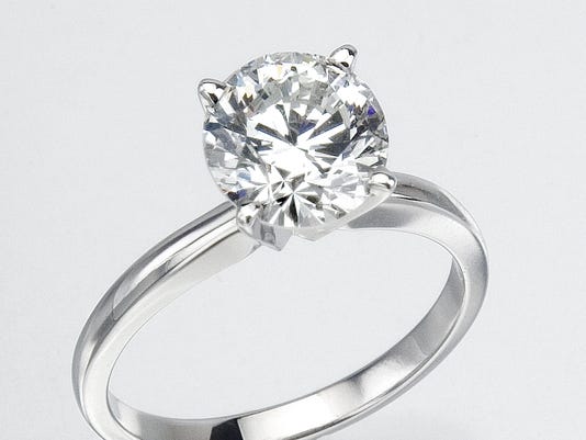 Can t buy  me love 5 engagement  ring  buying  tips