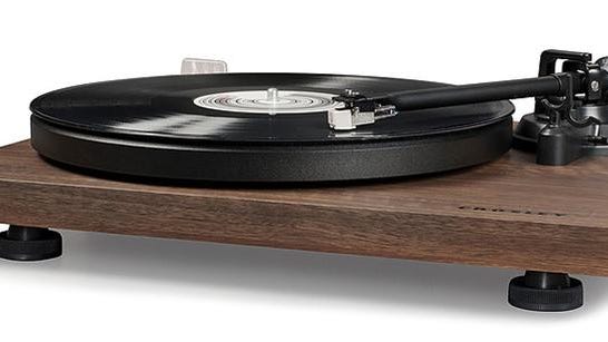 Connect speakers to the Crosley C6 turntable through the RCA outputs on the back, flip on the built-in preamp and jam.