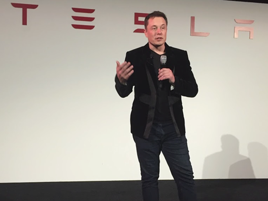 ElonMusk speaking at a product announcement