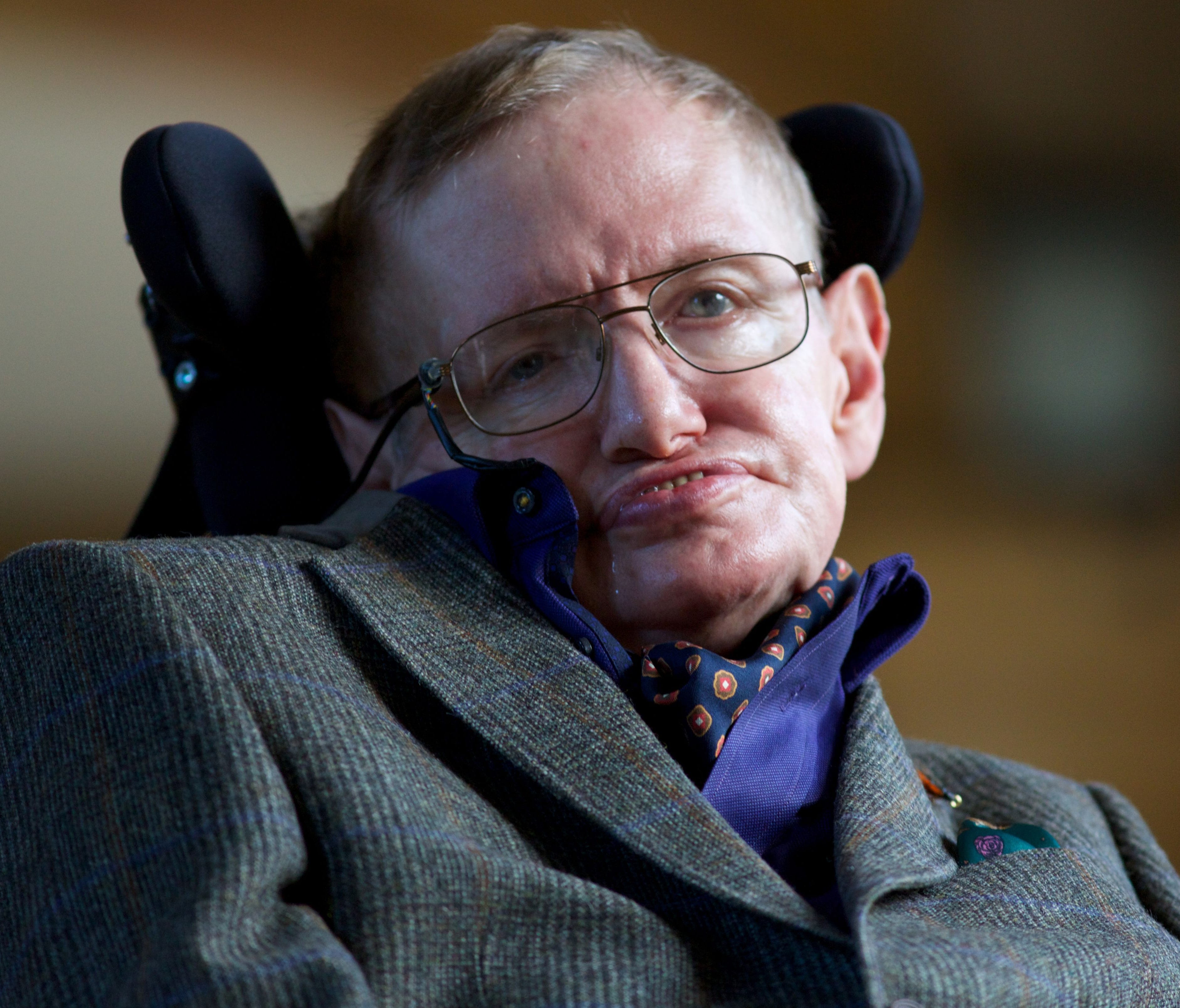 In this file photo taken on Sept. 19, 2013, theoretical physicist Stephen Hawking poses for a picture ahead of a gala screening of the documentary 