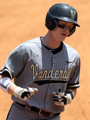 Vanderbilt’s Will Toffey rounds the bases after hitting a two-run home run against Texas A&M during the second inning of a game at the Southeastern Conference college baseball tournament at the Hoover Met, Saturday, May 23, 2015, in Hoover, Ala. (AP Photo/Butch Dill)