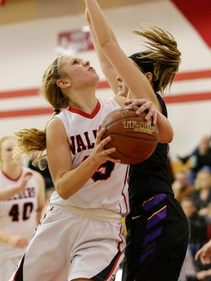 Valders' Jenna Evenson (15) drives to the basket against Sheboygan Falls on Dec. 22 at Valders High School.