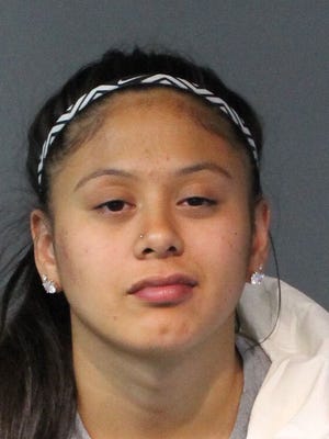 Janelle Sumilong, a player on the Wolf Pack basketball team, was arrested on two charges Monday morning.