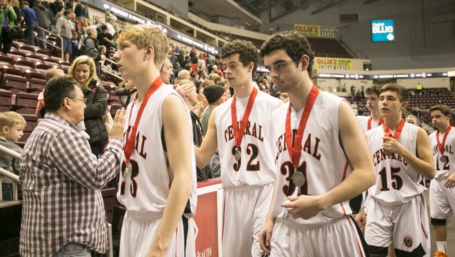 Central York players walk off the court after being defeated by Reading in Saturday's District 3 Class AAAA Final in Hershey. Amanda J. Cain photo
