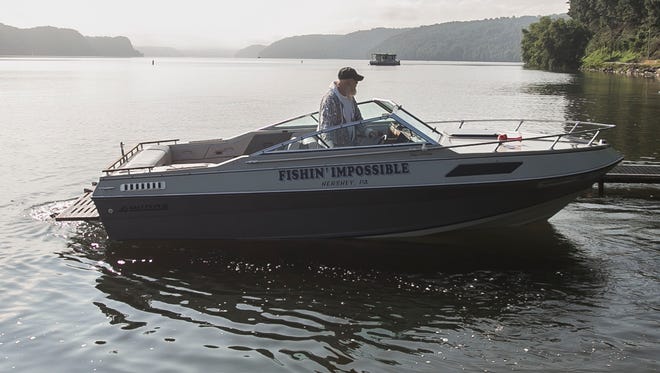 Paul O'Connor, of Harrisburg backs his boat off the dock, as he prepares to go fishing on the Susquehanna River Tuesday, Aug. 2, 2016, in Wrightsville. Amanda J. Cain photo
