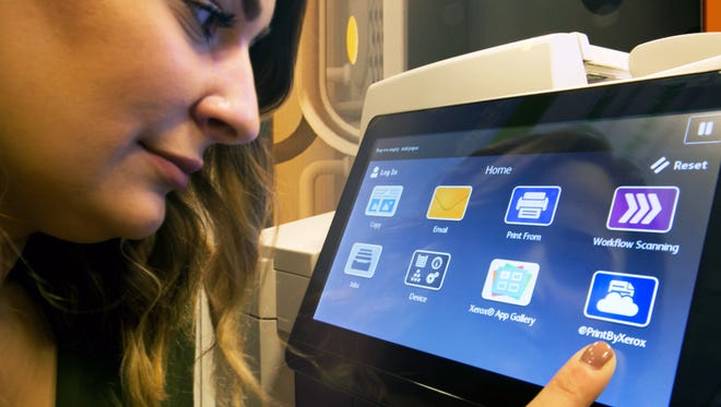 Engineer Kaitlyn Reidy helped develop an interface for Xerox ConnectKey-enabled multifunction printers that connects the device with the app world, making it easier for people to connect, communicate and work.