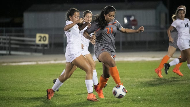 Lely's Alondra Castillo, shown during a 2018 regional playoff game, hopes to lead her Trojans to a district title when the Class 3A-District 14 tournament starts Friday.