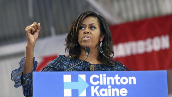 First lady Michelle Obama speaks at LaSalle University in Philadelphia on Sept. 28, 2016, as she campaigns for presidential candidate Hillary Clinton. Obama will will address an Arizona Democratic Party get-out-the-vote rally on Thursday in Phoenix.