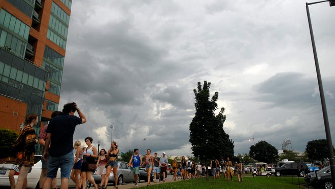Festivalgoers evacuate after threats of bad weather at the 2016 Forecastle Festival on Waterfront Park.  July 15, 2016