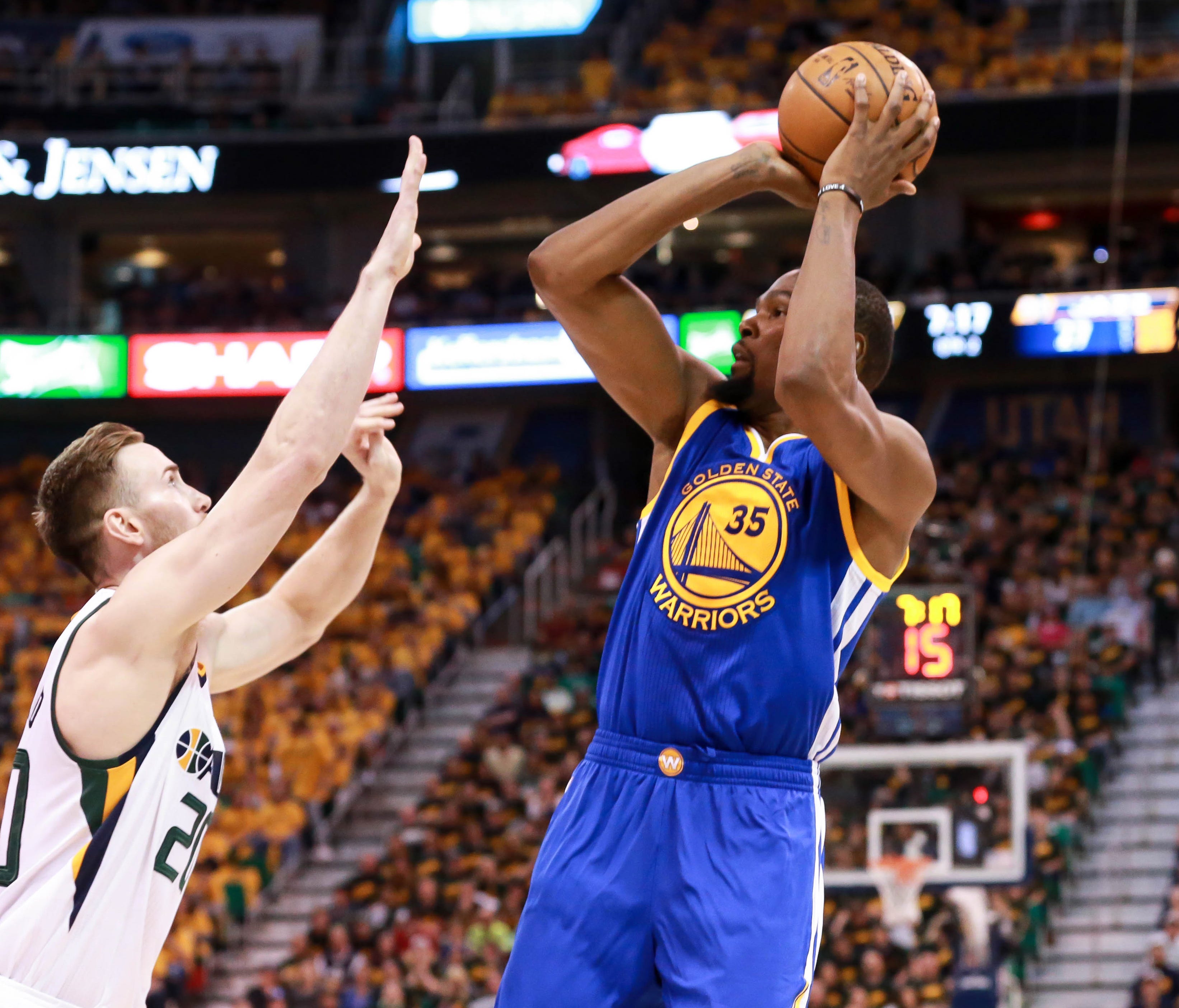Golden State Warriors forward Kevin Durant shoots the ball over Utah Jazz forward Gordon Hayward during the second quarter in Game 3.