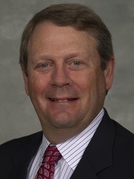 The board that runs CVG appointed Kroger executive Mike Schlotman as new Kenton County Airport Board chair on Monday night.