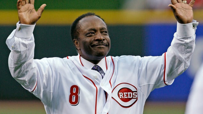 FILE - In this Wednesday, April 7, 2010, file photo, Cincinnati Reds Hall of Fame second baseman Joe Morgan acknowledges the crowd after throwing out a ceremonial first pitch prior to the Reds' baseball game against the St. Louis Cardinals, in Cincinnati. Hall of Fame second baseman Joe Morgan has died. A family spokesman says he died at his home Sunday, Oct. 11, 2020, in Danville, California.