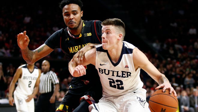 Butler guard Sean McDermott, right, drives against Maryland guard Jared Nickens during the first half of an NCAA college basketball game in College Park, Md., Wednesday, Nov. 15, 2017.